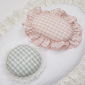 cozy gingham dog pillow